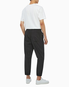 Buy 남성 사이즈 지퍼 조거 팬츠 in color CK BLACK