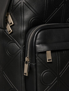 Buy 남성 라지 엠보스드 엠블럼 슬림 스퀘어 백팩 in color BLACK