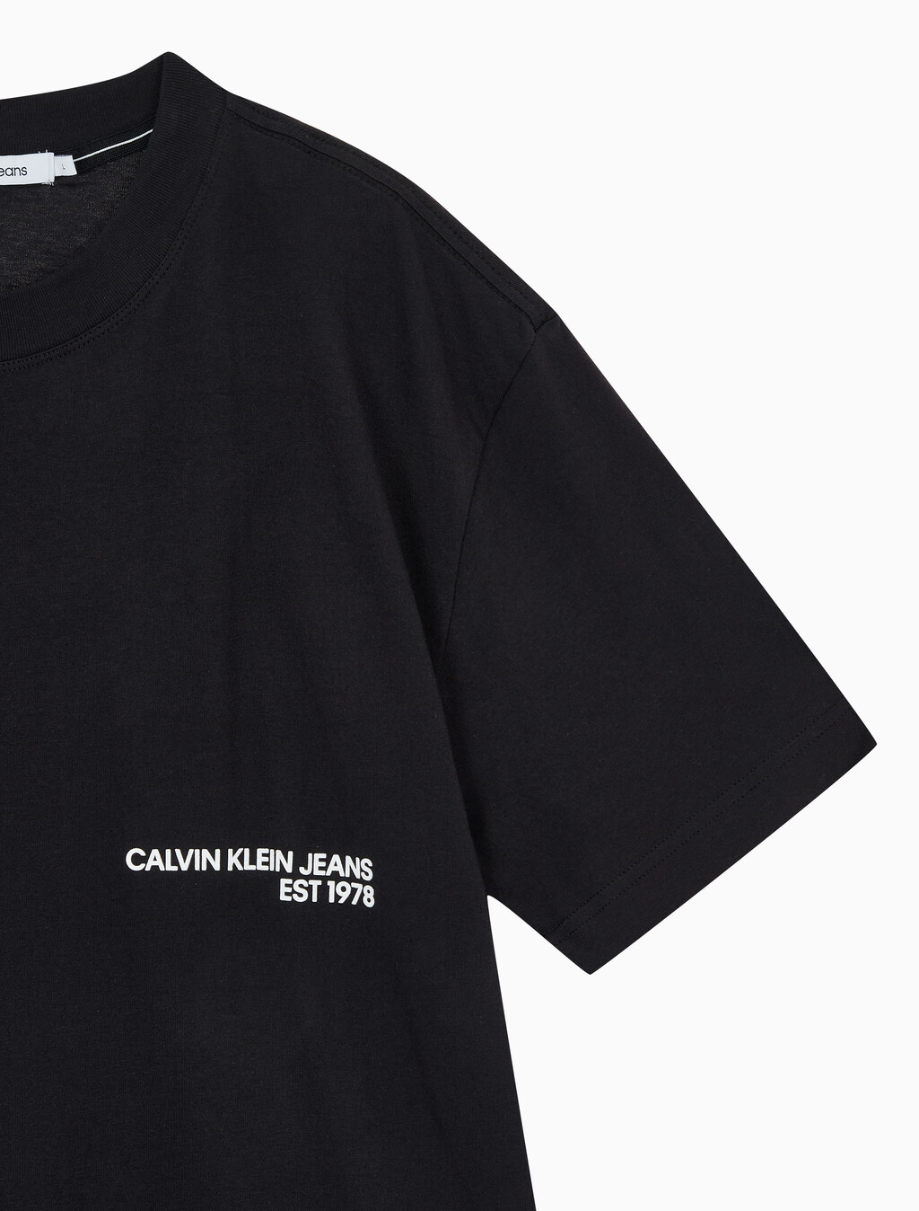 Buy 남성 릴렉스핏 CK 스프레이 로고 반팔 티셔츠 in color CK BLACK