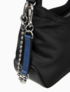 Buy 여성 CKJ 스컬티드 믹스 라운드 숄더백 in color BLACK