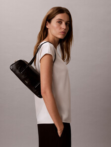 Buy 여성 엠보스드 로고 포일 글로시 발레토 백 in color BLACK