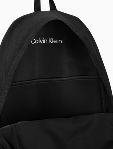 Buy 남녀공용 유틸리티 엠블럼 번지 백팩 in color BLACK