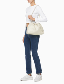 Buy 여성 CKJ 드로우스트링 숄더백 in color BEIGE