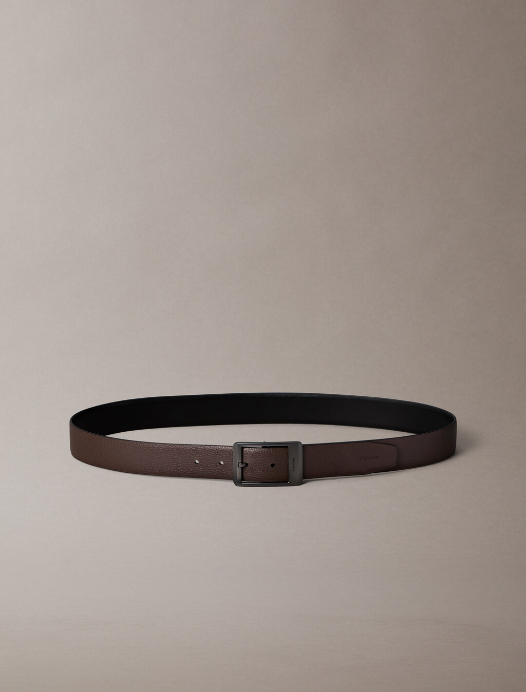 Buy 남성 센터 바 리버서블 벨트 in color Black AOP / Black / Matte Gunmetal